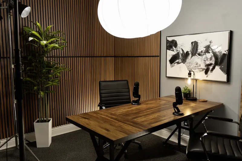 Podcast recording room with professional lighting