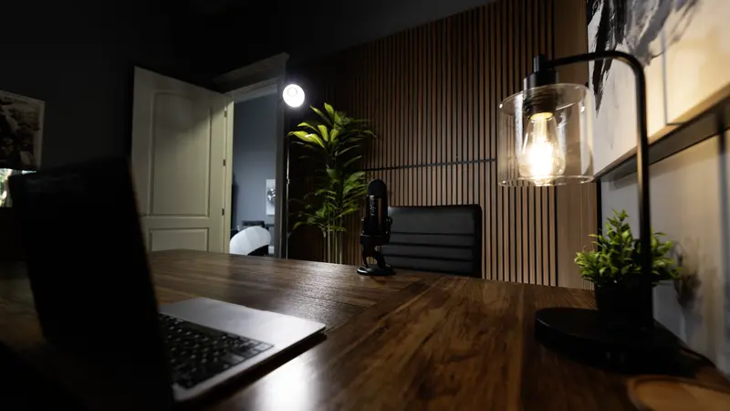 Solo podcast equipment setup with professional microphone